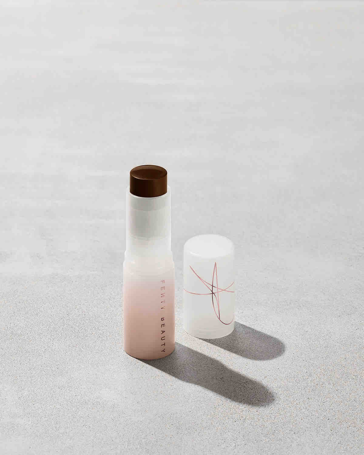 FB_F23_T2PRODUCT_CONCRETE_EAZEDROPSTICK_SHADE_25_1200x1500_sRGB72_COMPRESSED.jpg Eaze Drop Blur + Smooth Tint Stick - 25 - Image 1