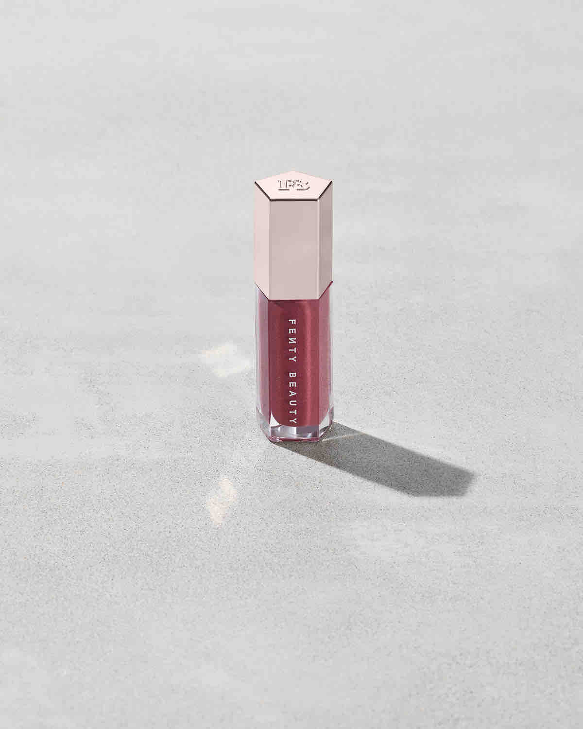 FB_F23_T2PRODUCT_CONCRETE_GLOSSBOMB_RIRI_CLOSED_4x5_sRGB72.jpg Gloss Bomb Universal Lip Luminizer - RiRi - Image 1