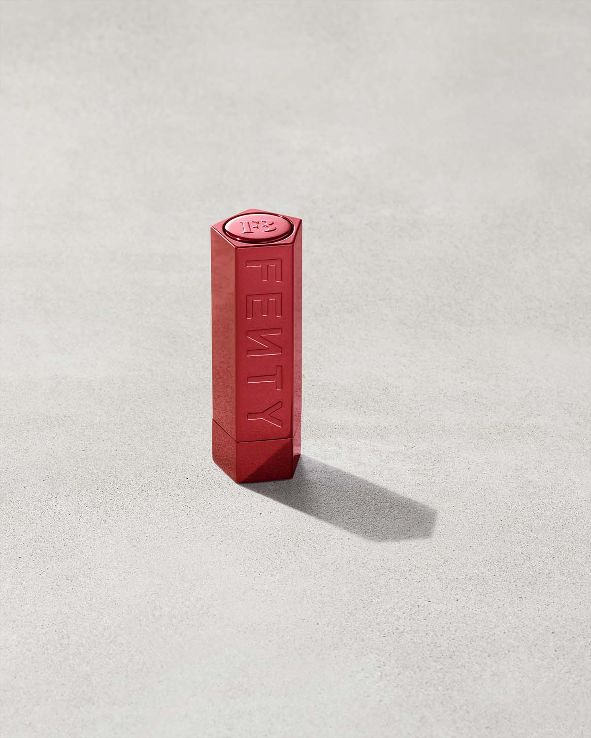 FB_POSTHOL22_T2PRODUCT_CONCRETE_FENTY_ICON_CASE_CLOSED_RED_1200x1500_50ce3959-15c1-4227-b28d-332ae79e67b7.jpg Fenty Icon The Case Semi-Matte Refillable Lipstick - Red Edition - Image 1