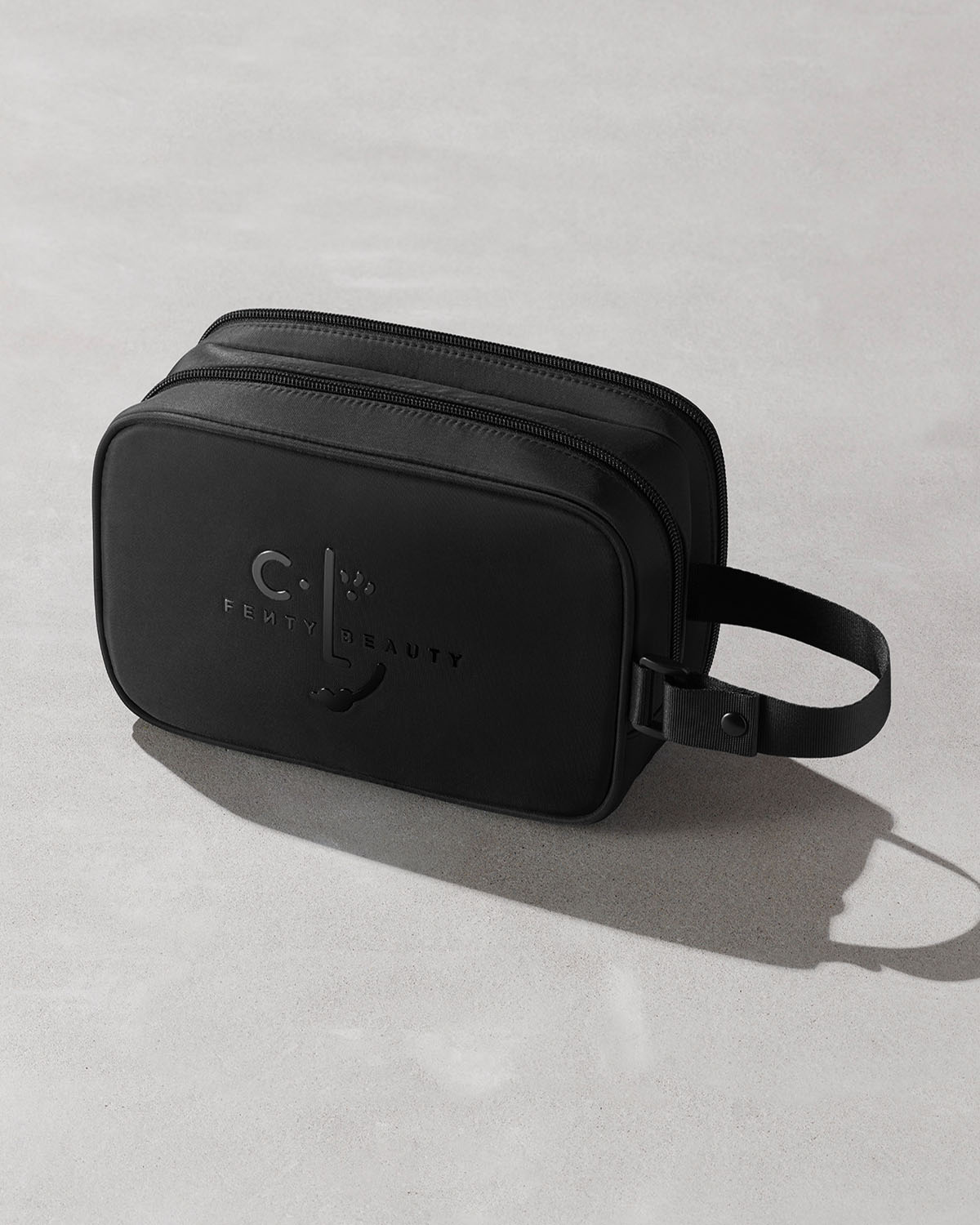 FB_POSTHOL23_T2PRODUCT_ECOMM_CLF_GIVINGTUESDAY_BAG_1200x1500_72DPI.jpg CLF Makeup Bag - Image 1