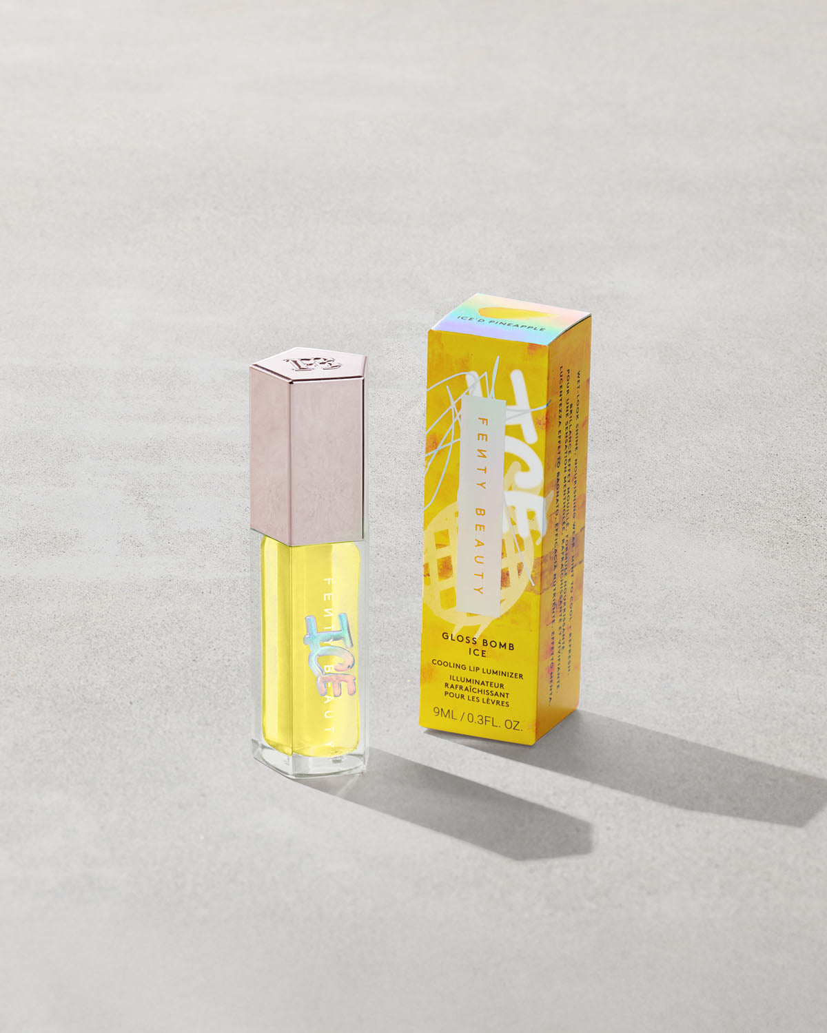FB_SMR25_T2PRODUCT_ECOMM_LE-FRUITZ_GB-ICE_PINEAPPLE_1200x1500_72DPI.jpg Gloss Bomb Ice Cooling Lip Luminizer - Ice'd Pineapple - Image 1