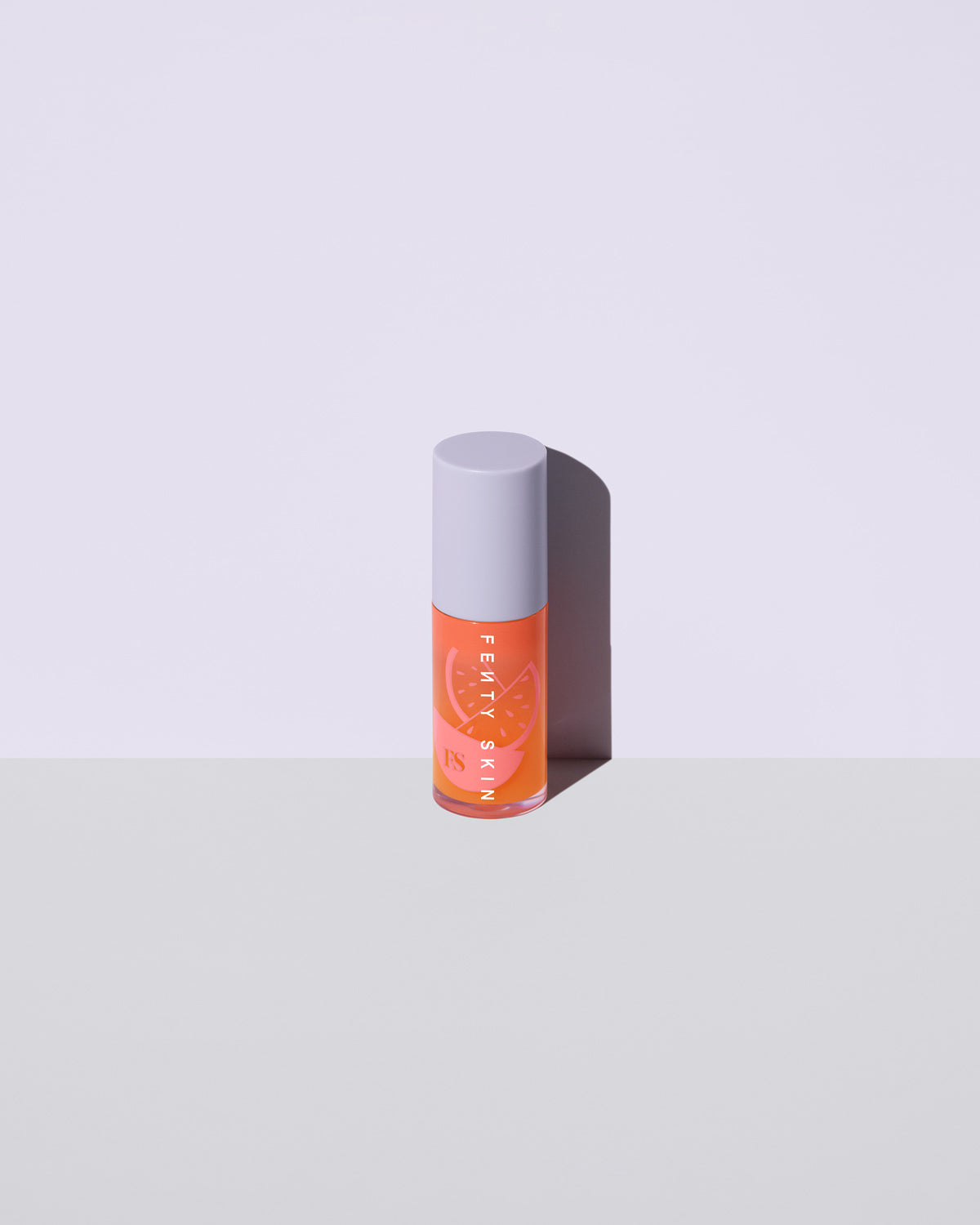 FS_SPR24_T2PRODUCT_ECOMM_MELON_TREAT_LIPOIL_CLOSED_002_sRGB72.jpg Fenty Treatz Hydrating + Strengthening Lip Oil - Kalahari Melon - Image 1